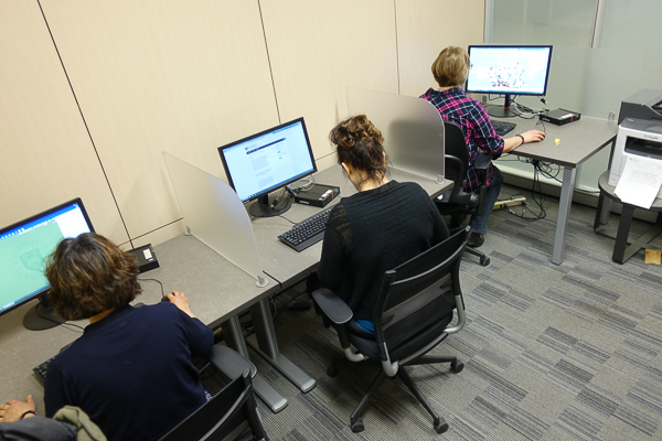 Three people working in the Assistive Technology Room in LIDHSL room 2440